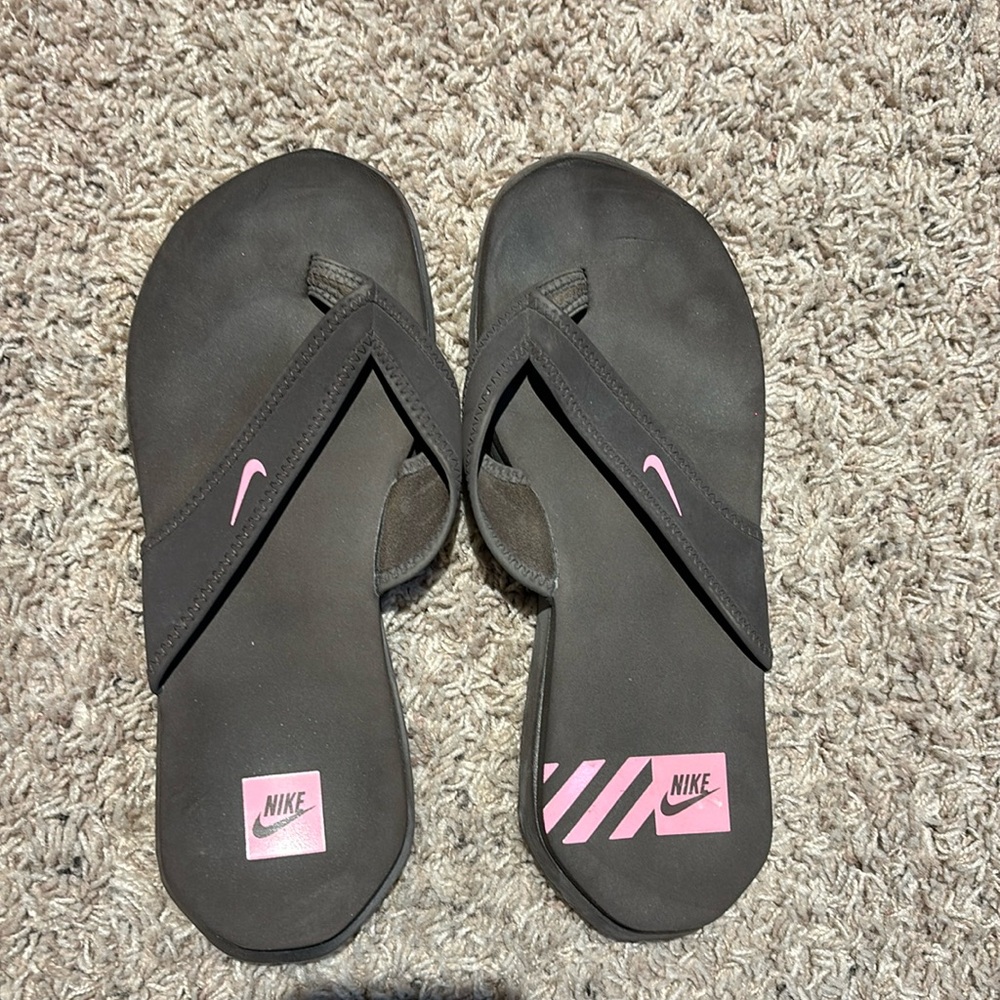 Nike flip flops.